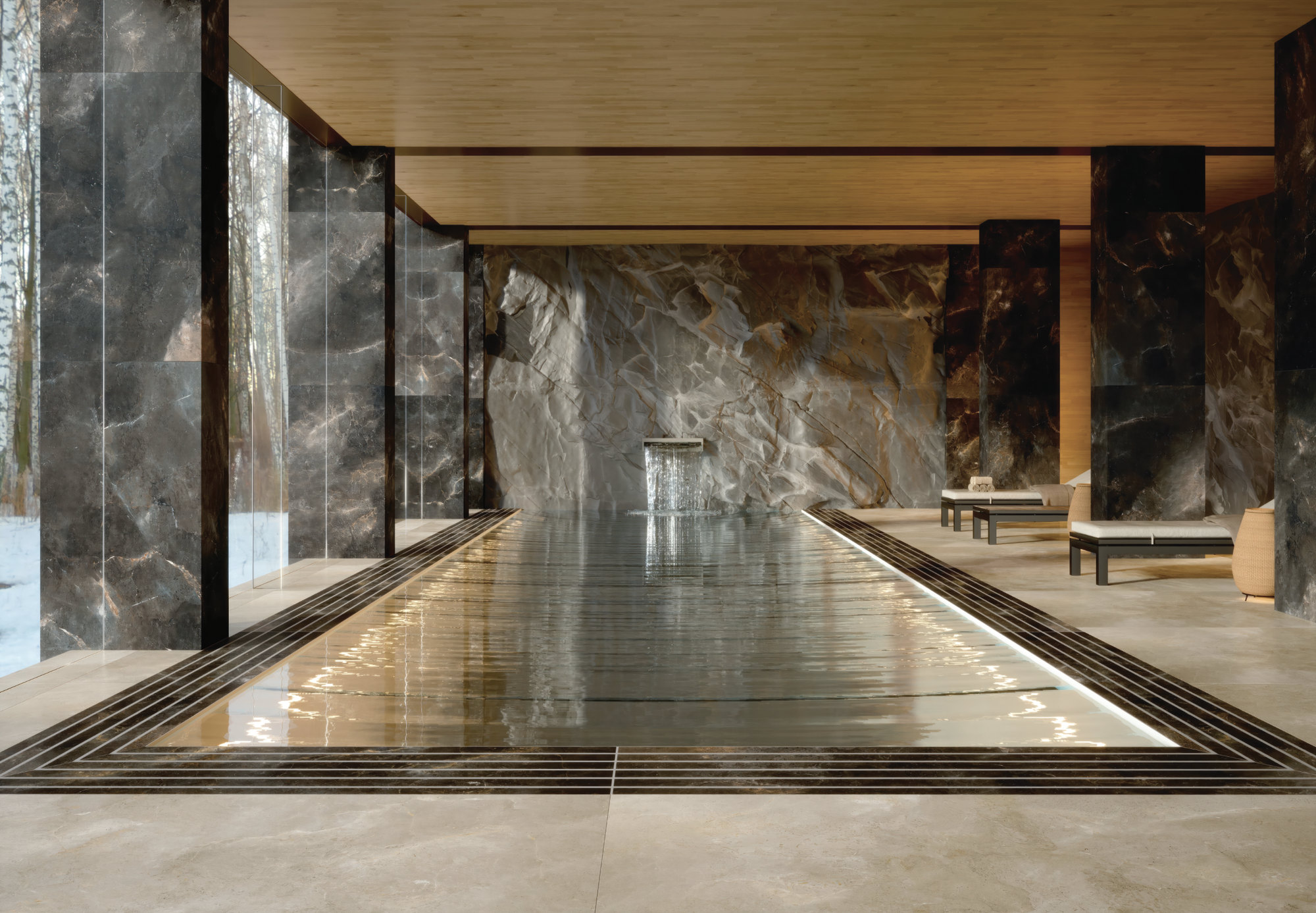 Indoor pool framed in large-format marble-effect slabs