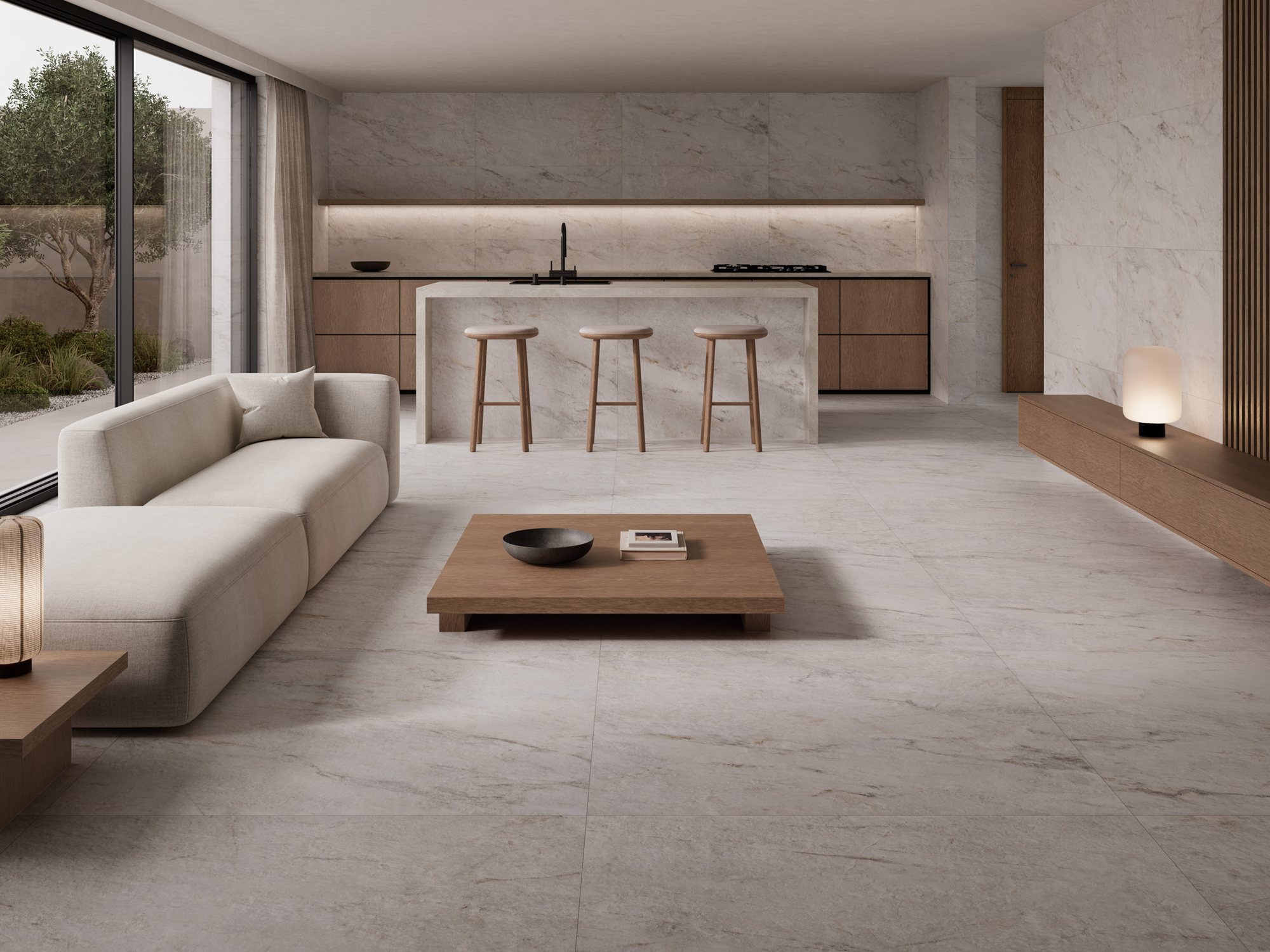 Open-plan living room and kitchen with a pale stone-effect floor and marble-effect island